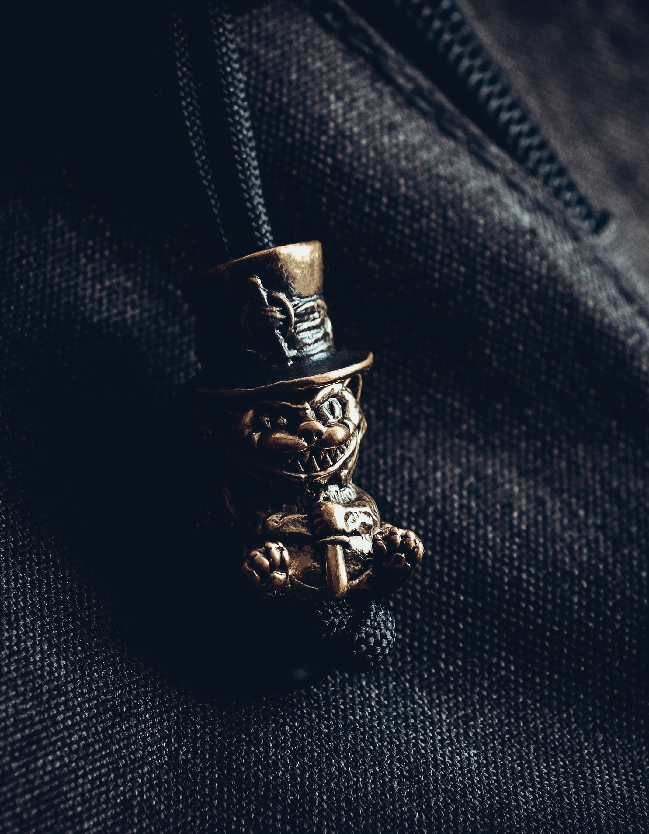 Cheshire Cat Keychain, Bronze on Paracord Cord