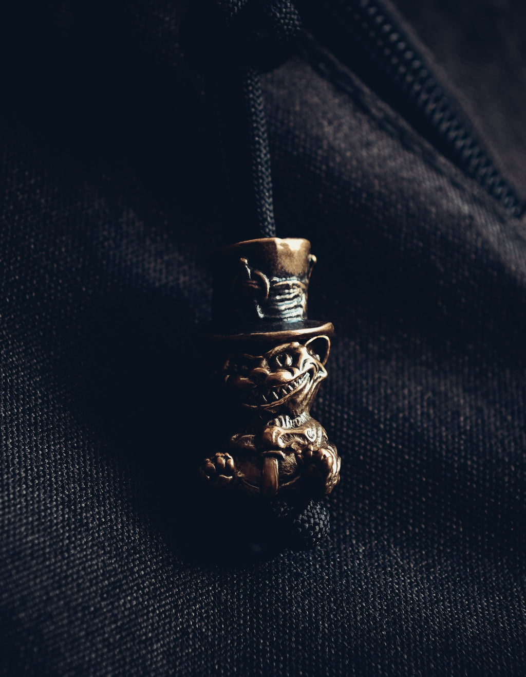 Cheshire Cat Keychain, Bronze on Paracord Cord