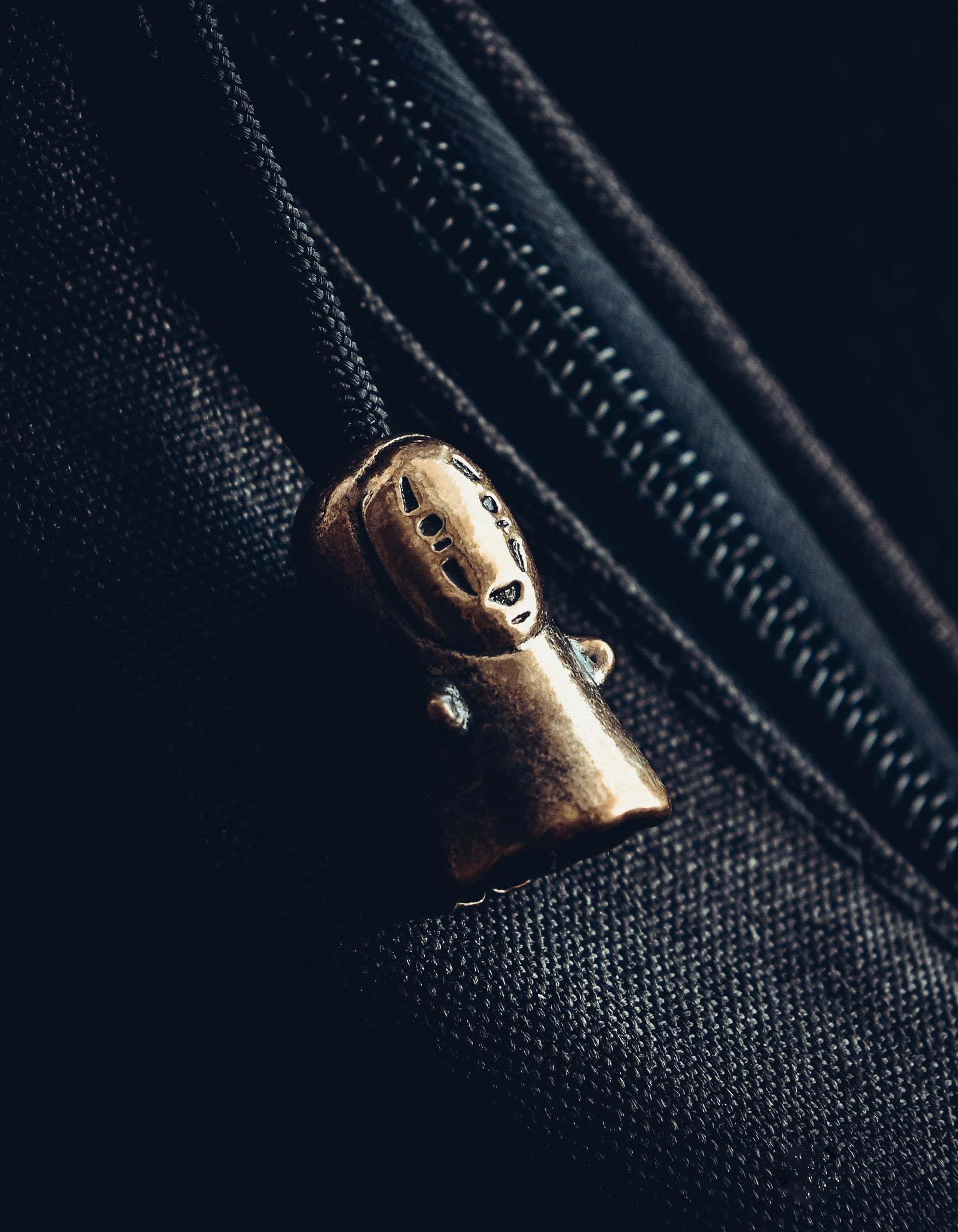 Faceless Keychain, Bronze on Paracord Cord