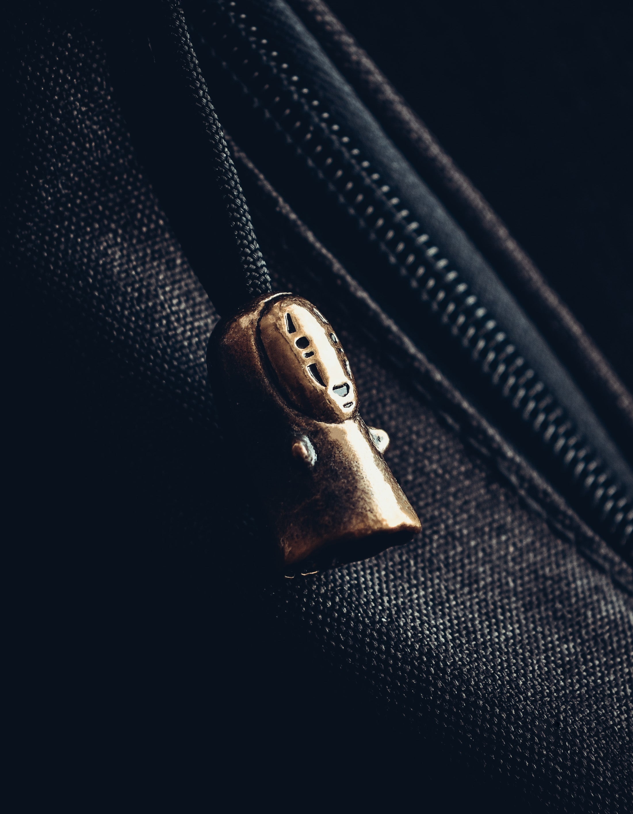 Faceless Keychain, Bronze on Paracord Cord