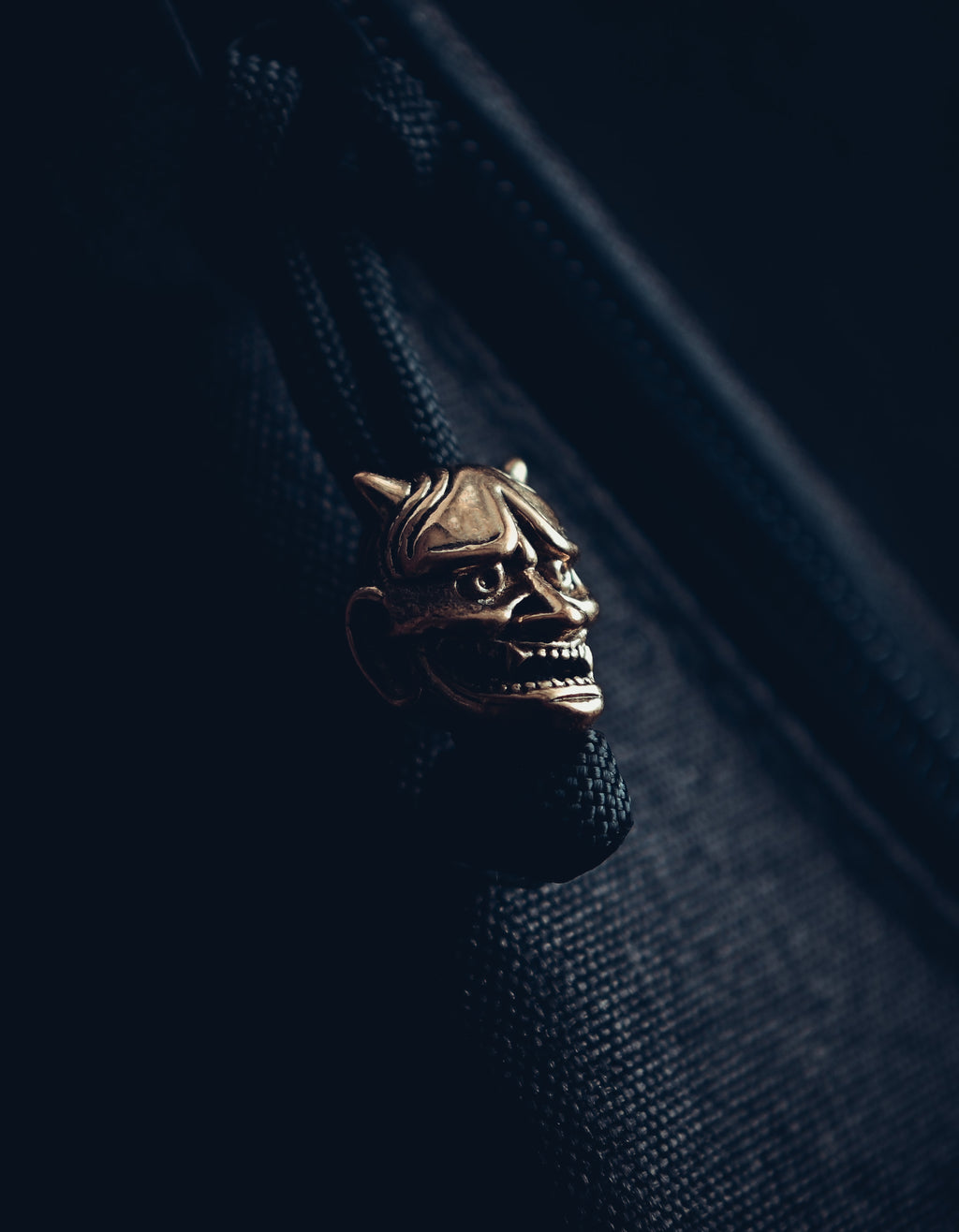 Japanese Hannya Mask Keychain, Bronze on Paracord Cord