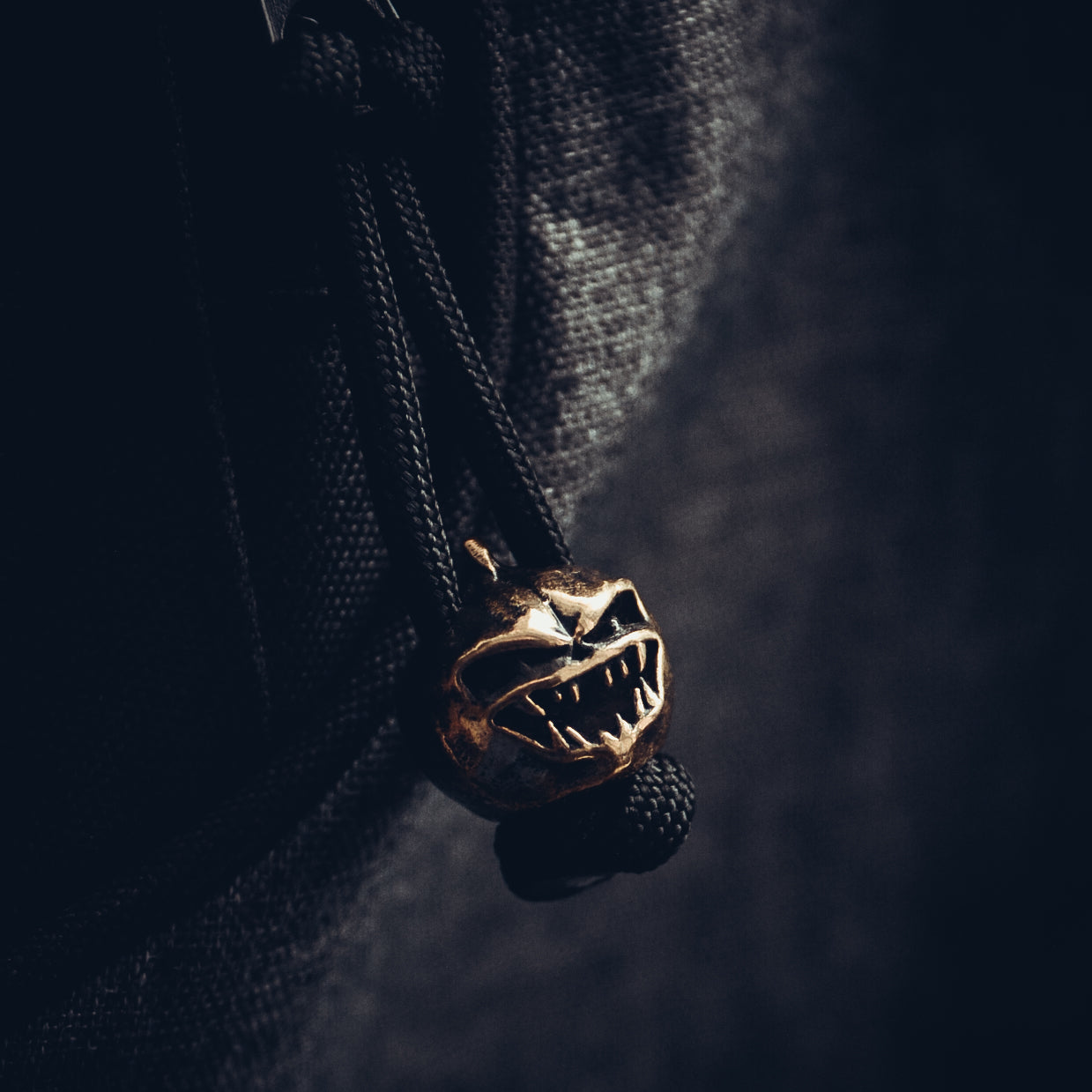 Angry Pumpkin Keychain, Bronze on Paracord Cord