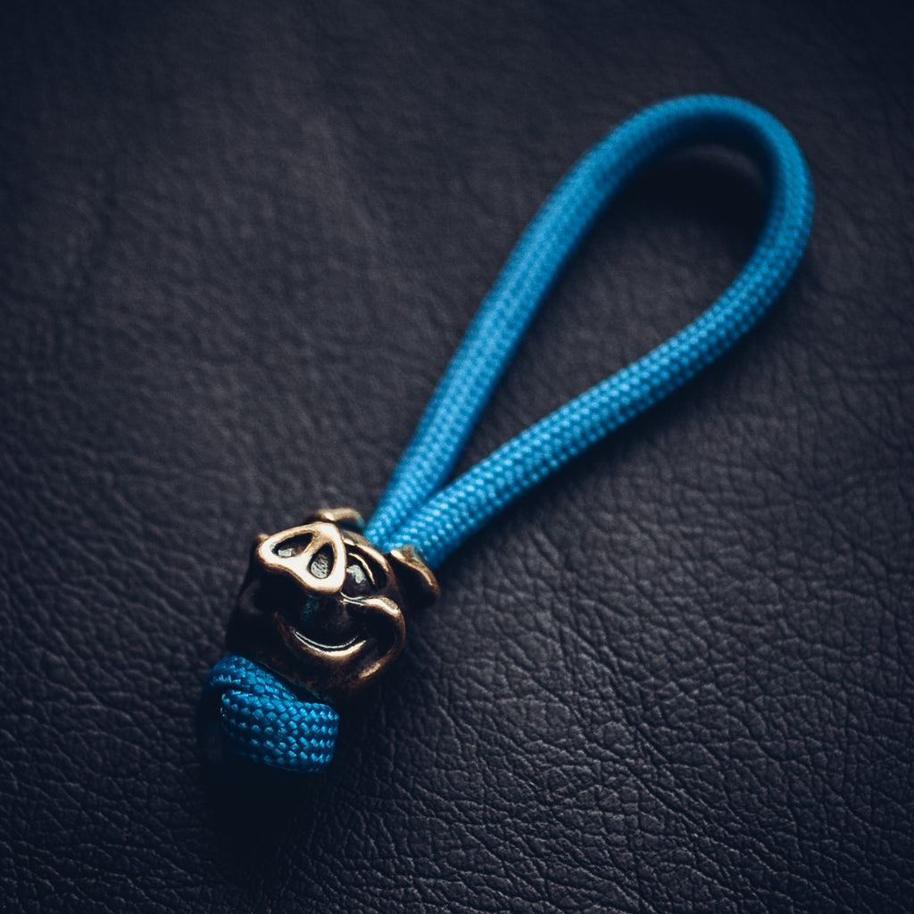 Pig Keychain, Bronze on Paracord Cord
