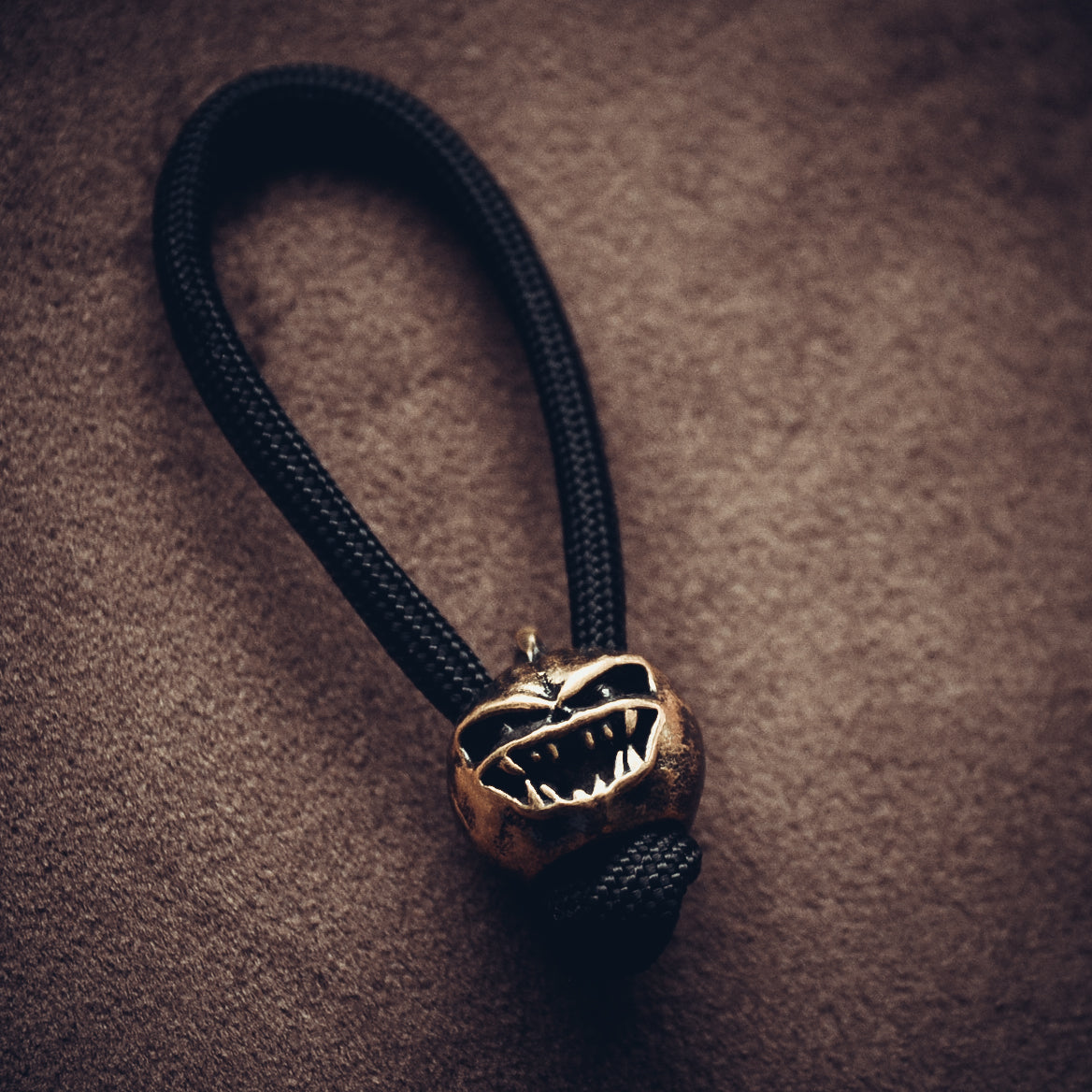 Angry Pumpkin Keychain, Bronze on Paracord Cord