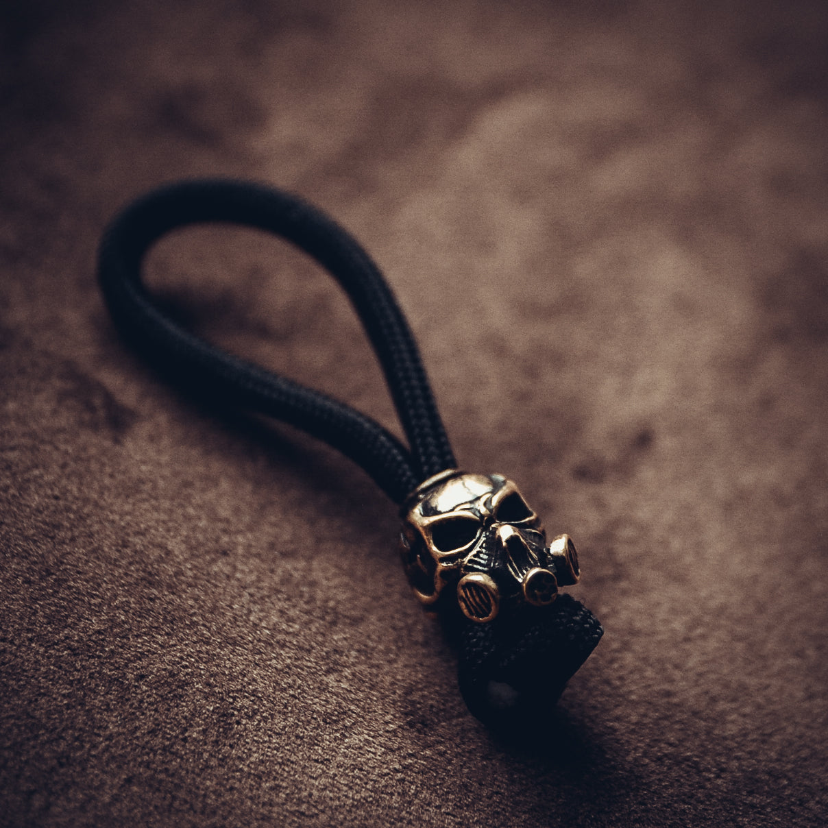 Skull in Mask with Scythe Keychain, Bronze on Paracord Cord